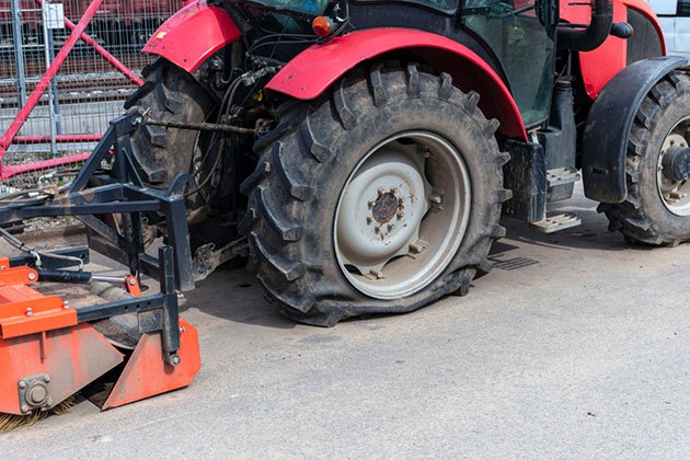 how much do a tractor tire weigh
