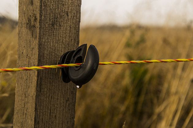 What are electric fence insulators