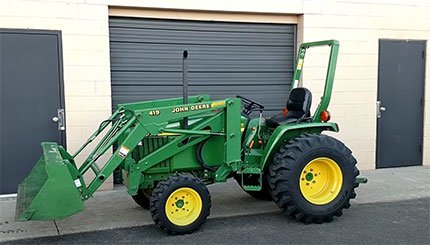 how much does a john deere 790 weight