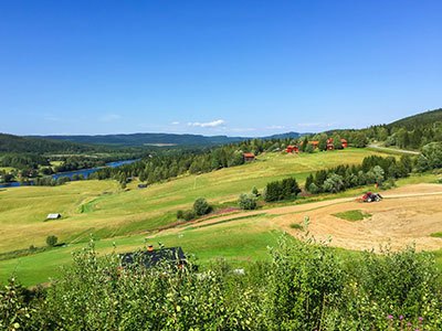 How do you stop a tractor on a hill?