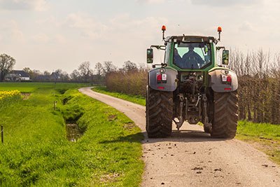 are farm tractors allowed on the road