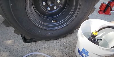 how to fill tractor tires with ballast