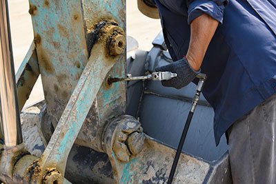 proper way to use a grease gun