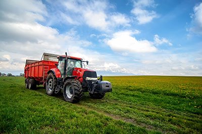 How do you get a tractor up a steep hill?