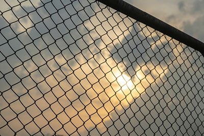 how to convert a chain link fence into a privacy fence