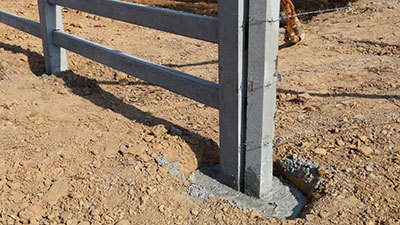 can you attach a gate to a concrete fence post