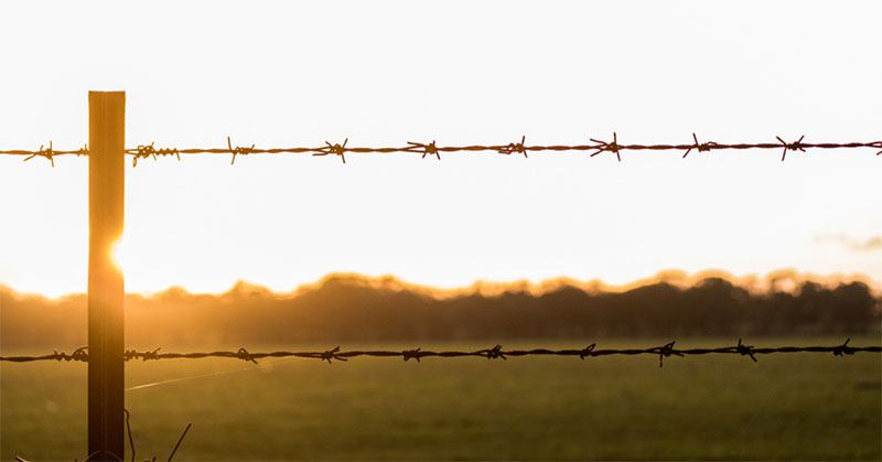 how to install a barbed wire fence